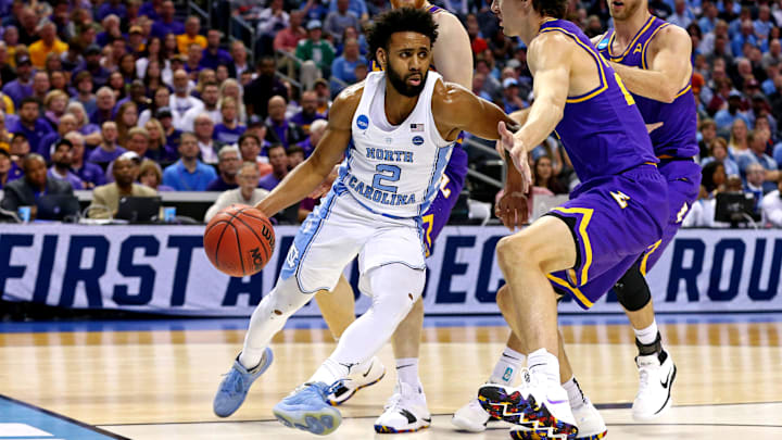 Mar 16, 2018; Charlotte, NC, USA; North Carolina Tar Heels guard Joel Berry II (2) drives to the basket against Lipscomb Bisons forward Eli Pepper (22) during the first half in the first round of the 2018 NCAA Tournament at Spectrum Center. Mandatory Credit: Jeremy Brevard-Imagn Images Mar 16, 2018; Charlotte, NC, USA; North Carolina Tar Heels guard Joel Berry II (2) drives to the basket against Lipscomb Bisons forward Eli Pepper (22) during the first half in the first round of the 2018 NCAA Tournament at Spectrum Center. Mandatory Credit: Jeremy Brevard-Imagn Images