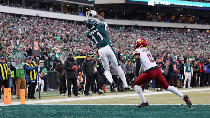 Jan 26, 2025; Philadelphia, PA, USA; Philadelphia Eagles wide receiver A.J. Brown (11) makes a catch for a touchdown against the Washington Commanders during the first half in the NFC Championship game at Lincoln Financial Field. Mandatory Credit: Bill Streicher-Imagn Images Jan 26, 2025; Philadelphia, PA, USA; Philadelphia Eagles wide receiver A.J. Brown (11) makes a catch for a touchdown against the Washington Commanders during the first half in the NFC Championship game at Lincoln Financial Field. Mandatory Credit: Bill Streicher-Imagn Images