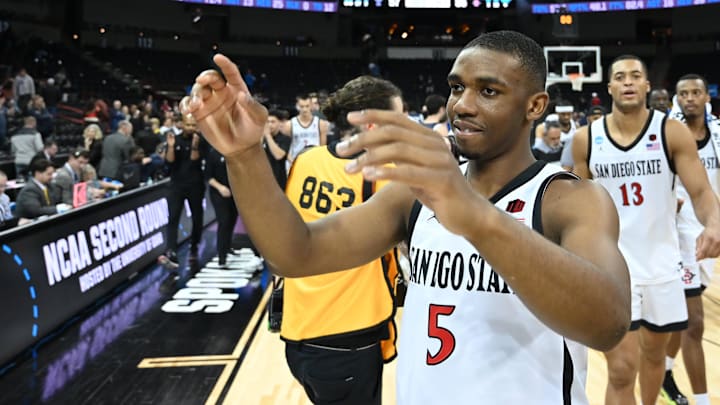 Mar 24, 2024; Spokane, WA, USA; San Diego State Aztecs guard Lamont Butler (5) celebrates after defeating the Yale Bulldogs at Spokane Veterans Memorial Arena. Mandatory Credit: James Snook-USA TODAY Sports