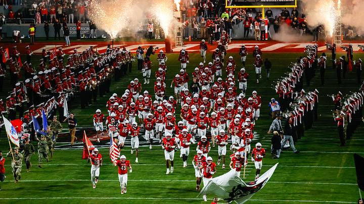 Nov 21, 2025; Raleigh, North Carolina, USA;  NC State Wolfpack takes to the field prior to the first half of the game against Florida State Seminoles at Carter-Finley Stadium. Mandatory Credit: Jaylynn Nash-Imagn Images