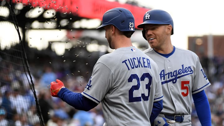 Apr 18, 2026; Denver, Colorado, USA; Los Angeles Dodgers outfielder Kyle Tucker (23) celebrates with  infielder Freddie Freeman (5) and teammates after a home run during the first inning against the Colorado Rockies at Coors Field. Mandatory Credit: Christopher Hanewinckel-Imagn Images