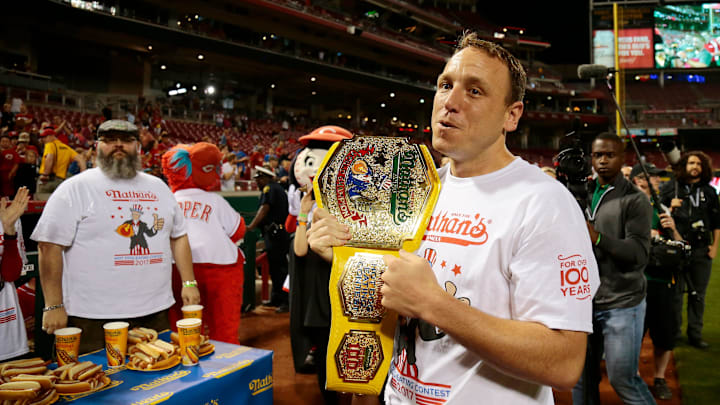 Joey Chestnut and the mustard yellow belt. 