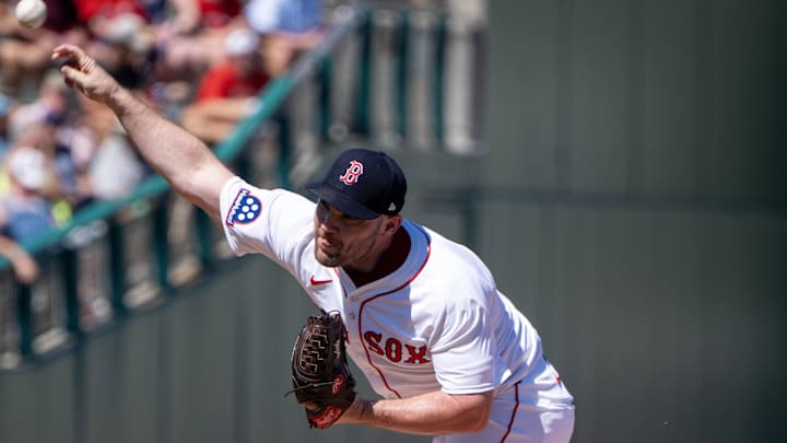 Boston Red Sox Liam Hendriks (31) pitching during the third inning of their game with the New York Mets at JetBlue Park at Fenway South in 2025.