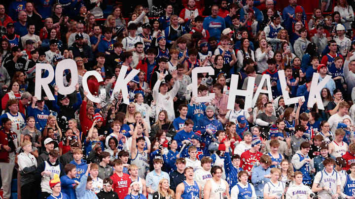 Kansas Jayhawks fans throw up paper as the starting lineup is announced in the game against Arizona State Sun Devils inside Allen Fieldhouse Wednesday, Jan. 8, 2025.
