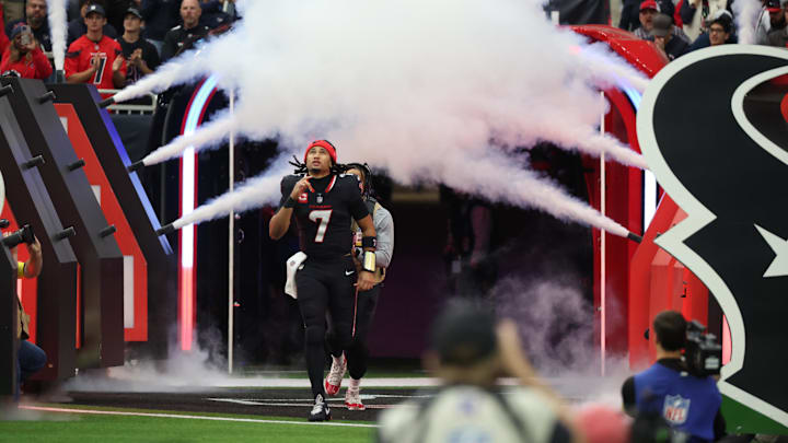 Jan 11, 2025; Houston, Texas, USA; Houston Texans quarterback C.J. Stroud (7) is introduced before playing against the Los Angeles Chargers in an AFC wild card game at NRG Stadium. Mandatory Credit: Thomas Shea-Imagn Images
