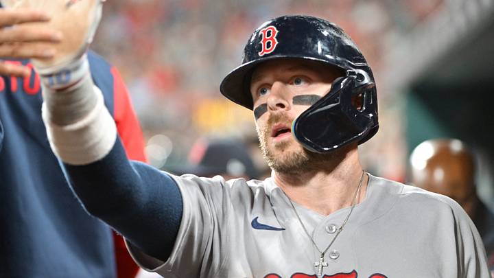 Apr 10, 2026; St. Louis, Missouri, USA; Boston Red Sox shortstop Trevor Story (10) is congratulated in the dugout after scoring in the fourth inning against the St. Louis Cardinals at Busch Stadium. Mandatory Credit: Tim Vizer-Imagn Images