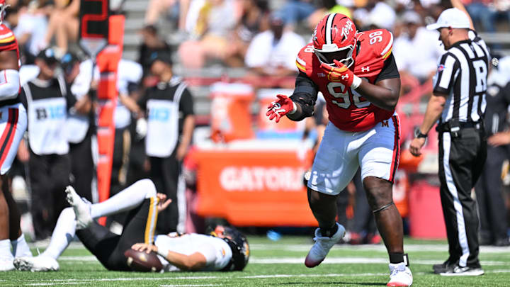 Sep 13, 2025; College Park, Maryland, USA; Maryland Terrapins defensive lineman Eyan Thomas (98) celebrates after sacking Towson Tigers quarterback Andrew Indorf in the first half at SECU Stadium