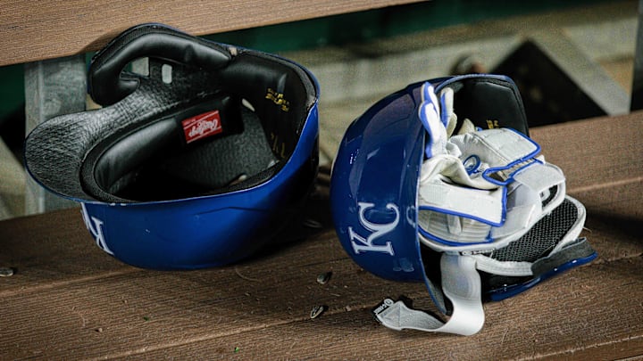 Apr 10, 2024; Kansas City, Missouri, USA; Kansas City Royals batting helmets in the dugout after the game against the Houston Astros at Kauffman Stadium. Mandatory Credit: William Purnell-Imagn Images