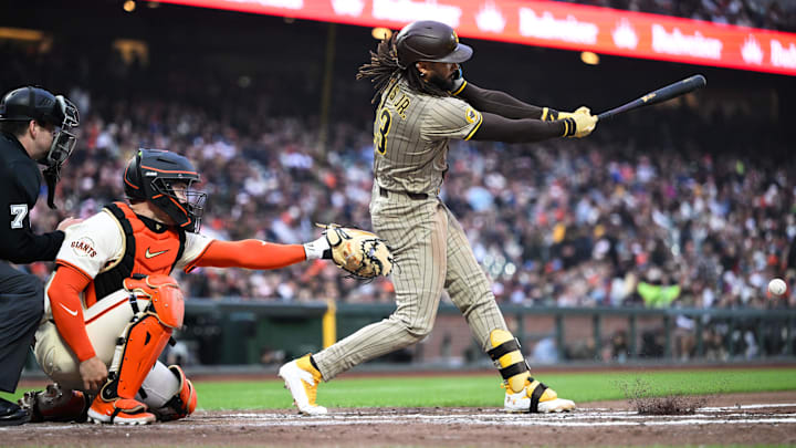 Jun 4, 2025; San Francisco, California, USA; San Diego Padres right fielder Fernando Tatis Jr. (23) hits a single against the San Francisco Giants in the fifth inning at Oracle Park. Mandatory Credit: Eakin Howard-Imagn Images