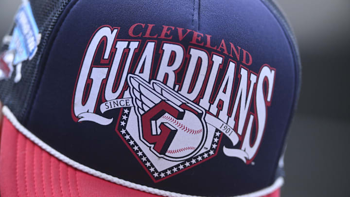 Jul 23, 2024; Cleveland, Ohio, USA; A fan wears a Cleveland Guardians cap during a game against the Detroit Tigers at Progressive Field.