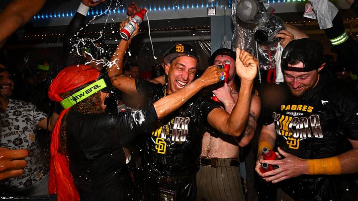 Sep 24, 2026; Los Angeles, California, USA; San Diego Padres owners Jose E. Feliciano and Kwanza Jones celebrate with the team after securing a playoff spot at Dodger Stadium. Mandatory Credit: William Liang-Imagn Images Sep 24, 2026; Los Angeles, California, USA; San Diego Padres owners Jose E. Feliciano and Kwanza Jones celebrate with the team after securing a playoff spot at Dodger Stadium. Mandatory Credit: William Liang-Imagn Images