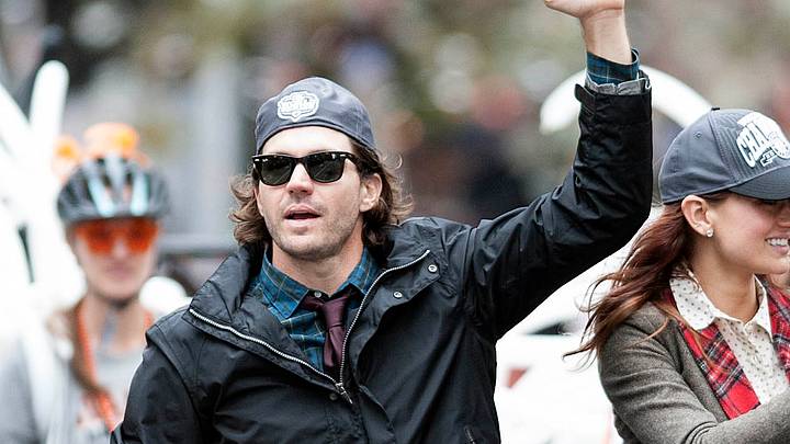 San Francisco, CA, USA; San Francisco Giants starting pitcher Barry Zito (75) pumps his fist during the World Series victory parade at Market Street. The Giants defeated the Detroit Tigers in a four-game sweep to win the 2012 World Series. Mandatory Credit: Ed Szczepanski-USA TODAY Sports