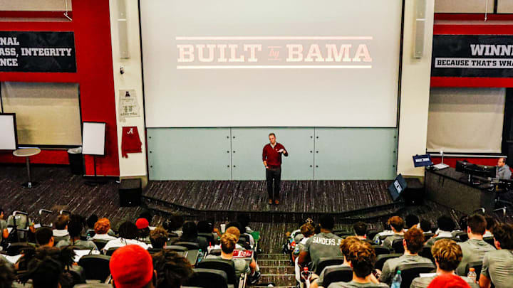Greg McElroy speaks to the Alabama football team in the 2026 offseason