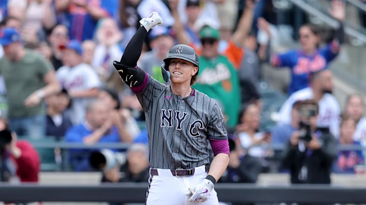 May 31, 2025; New York City, New York, USA; New York Mets third baseman Brett Baty (7) celebrates his three run triple against the Colorado Rockies during the first inning at Citi Field. Mandatory Credit: Brad Penner-Imagn Images