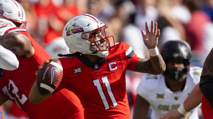 Oct 19, 2024; Tucson, Arizona, USA; Arizona Wildcats quarterback Noah Fifita (11) against the Colorado Buffalos at Arizona Stadium. Mandatory Credit: Mark J. Rebilas-Imagn Images Oct 19, 2024; Tucson, Arizona, USA; Arizona Wildcats quarterback Noah Fifita (11) against the Colorado Buffalos at Arizona Stadium. Mandatory Credit: Mark J. Rebilas-Imagn Images