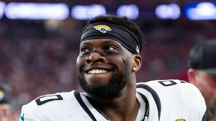 Nov 23, 2025; Glendale, Arizona, USA; Jacksonville Jaguars defensive lineman Emmanuel Ogbah (90) against the Arizona Cardinals at State Farm Stadium. Mandatory Credit: Mark J. Rebilas-Imagn Images