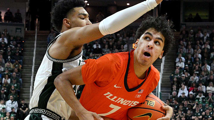 Jan 19, 2025; East Lansing, Michigan, USA; Illinois Fighting Illini forward Will Riley (7) tries to get past Michigan State Spartans guard Jaden Akins (3) during the first half at Jack Breslin Student Events Center. Mandatory Credit: Dale Young-Imagn Images Jan 19, 2025; East Lansing, Michigan, USA; Illinois Fighting Illini forward Will Riley (7) tries to get past Michigan State Spartans guard Jaden Akins (3) during the first half at Jack Breslin Student Events Center. Mandatory Credit: Dale Young-Imagn Images