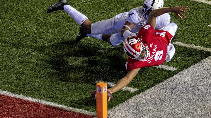 Indiana Hoosiers quarterback Michael Penix Jr. (9) dives with the ball to score a two point conversion and win the game in overtime during the game at Memorial Stadium. The Indiana Hoosiers defeated the Penn State Nittany Lions 36-35.