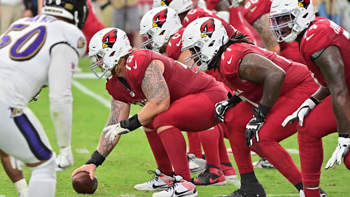 Oct 29, 2023; Glendale, Arizona, USA;  The Arizona Cardinals offense lines up against the Baltimore Ravens defense in the second half at State Farm Stadium. Mandatory Credit: Matt Kartozian-Imagn Images