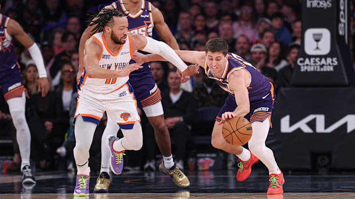 Apr 6, 2025; New York, New York, USA; Phoenix Suns guard Collin Gillespie (12) steals the ball from New York Knicks guard Jalen Brunson (11) during the first half at Madison Square Garden. Mandatory Credit: Vincent Carchietta-Imagn Images Apr 6, 2025; New York, New York, USA; Phoenix Suns guard Collin Gillespie (12) steals the ball from New York Knicks guard Jalen Brunson (11) during the first half at Madison Square Garden. Mandatory Credit: Vincent Carchietta-Imagn Images