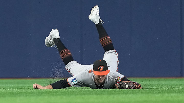 Sep 12, 2025; Toronto, Ontario, CAN; Baltimore Orioles centre fielder Colton Cowser (17) makes a diving catch for an out against the Toronto Blue Jays during the sixth inning at Rogers Centre. Mandatory Credit: Nick Turchiaro-Imagn Images Sep 12, 2025; Toronto, Ontario, CAN; Baltimore Orioles centre fielder Colton Cowser (17) makes a diving catch for an out against the Toronto Blue Jays during the sixth inning at Rogers Centre. Mandatory Credit: Nick Turchiaro-Imagn Images