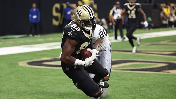 Sep 27, 2026; New Orleans, Louisiana, USA;  New Orleans Saints tight end Juwan Johnson (83) cathces the ball for a touchdown in the first quarter against the Las Vegas Raiders at Caesars Superdome.  Mandatory Credit: Stephen Lew-Imagn Images