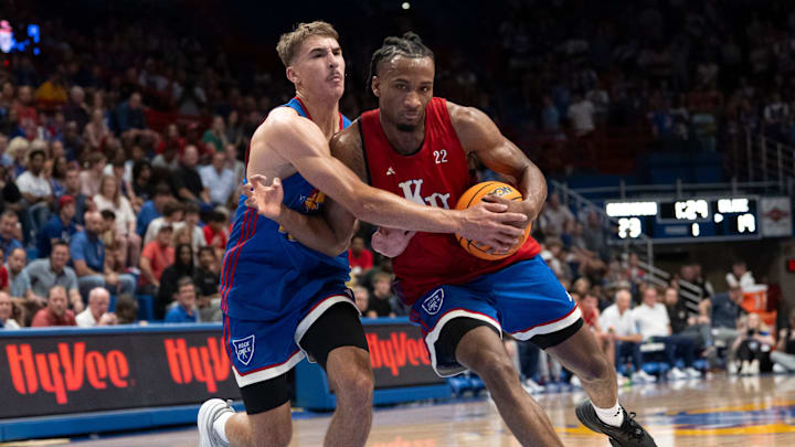 Kansas men's basketball's Darryn Peterson (22) drives to the basket during Late Night in the Phog, Friday, Oct. 17, 2025 at Allen Fieldhouse .
