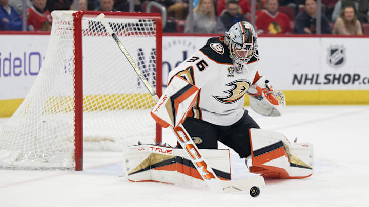 Mar 12, 2024; Chicago, Illinois, USA;  Anaheim Ducks goaltender John Gibson (36) defends the net against the Chicago Blackhawks at United Center. Mandatory Credit: Jamie Sabau-Imagn Images