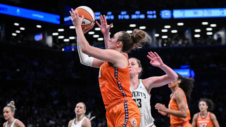 Connecticut Sun guard Marina Mabrey (3) shoots the ball while defended by New York Liberty center Emma Meesseman (33) during the second half at Barclays Center. 