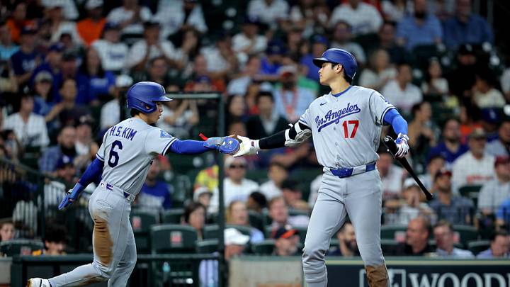May 6, 2026; Houston, Texas, USA; Los Angeles Dodgers shortstop Hyeseong Kim (6) is congratulated by designated hitter Shohei Ohtani (17) after scoring a run against the Houston Astros during the seventh inning at Daikin Park. Mandatory Credit: Erik Williams-Imagn Images
