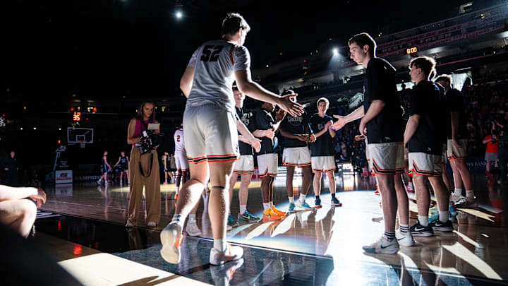 Valley's Trevin Jirak (52) is introduced during the Class 4A state title game on Friday, March 14, 2025, at Wells Fargo Arena.