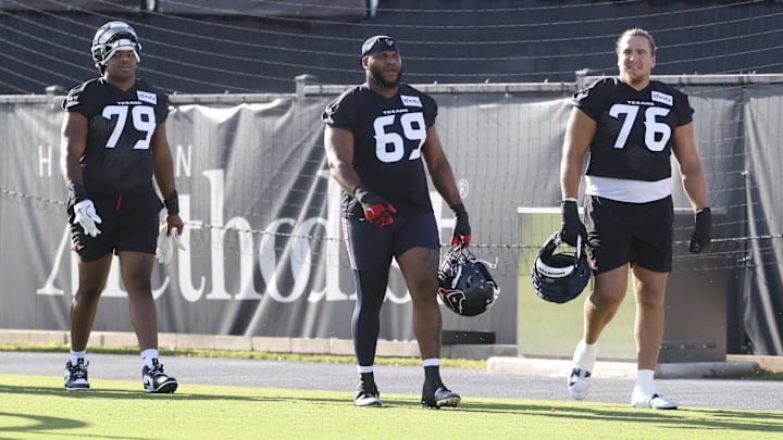 Houston Texans offensive tackle Aireontae Ersery (79) and guard Ed Ingram (69) and tackle Austin Deculus (76) during training camp at Houston Methodist Training Center.