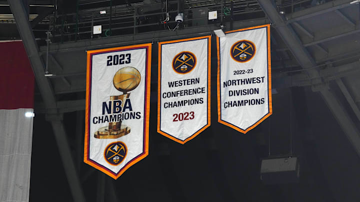 Oct 30, 2023; Denver, Colorado, USA; General view of the Denver Nuggets 2023 championship banners before the game at Ball Arena. Mandatory Credit: Ron Chenoy-Imagn Images