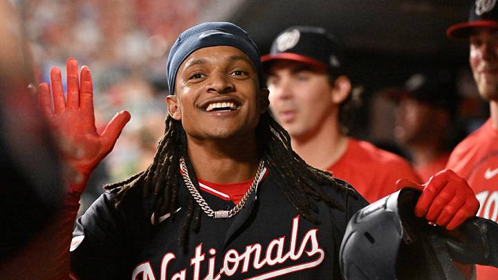 Sep 18, 2026; St. Louis, Missouri, USA;  Washington Nationals shortstop CJ Abrams (5) is congratulated by teammates after scoring against the St. Louis Cardinals during and joining the 30-30 club the first inning at Busch Stadium.  Mandatory Credit: Jeff Le-Imagn Images