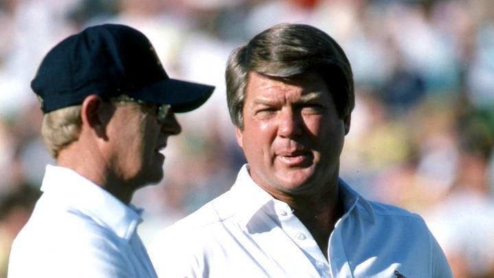 Nov 28, 1987, Miami Gardens, FL, USA; FILE PHOTO; Notre Dame Fighting Irish head coach Lou Holtz (left) on the field talking with Miami Hurricanes head coach Jimmy Johnson (right) at Sun Life Stadium during the 1987 season. Mandatory Credit: Malcolm Emmons-USA TODAY Sports