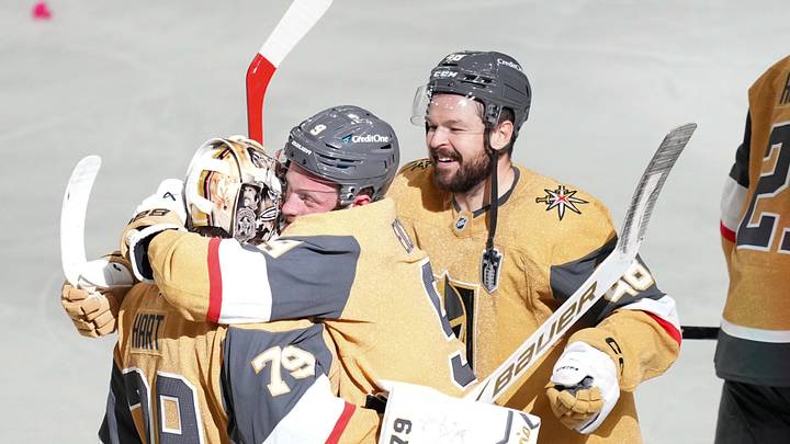 Jun 6, 2026; Las Vegas, Nevada, USA; Vegas Golden Knights center Jack Eichel (9) and center Tomas Hertl (48) congratulates goaltender Carter Hart (79) after a double overtime win in game three of the 2026 Stanley Cup Final against the Carolina Hurricanes at T-Mobile Arena. Mandatory Credit: Lucas Peltier-Imagn Images