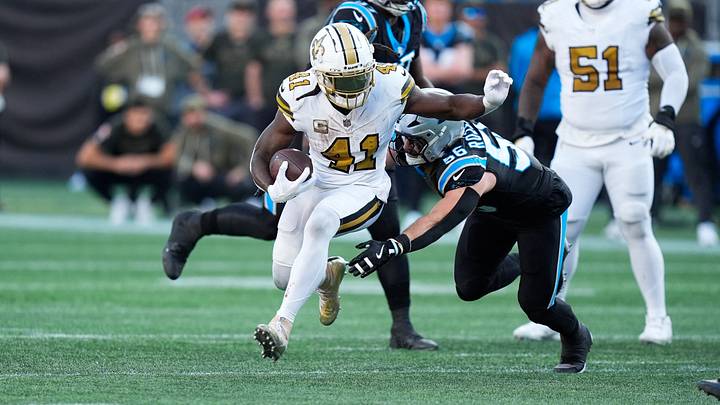 Nov 9, 2025; Charlotte, North Carolina, USA; New Orleans Saints running back Alvin Kamara (41) rushes as Carolina Panthers linebacker Christian Rozeboom (56) defends during the fourth quarter at Bank of America Stadium. Mandatory Credit: Jim Dedmon-Imagn Images Nov 9, 2025; Charlotte, North Carolina, USA; New Orleans Saints running back Alvin Kamara (41) rushes as Carolina Panthers linebacker Christian Rozeboom (56) defends during the fourth quarter at Bank of America Stadium. Mandatory Credit: Jim Dedmon-Imagn Images
