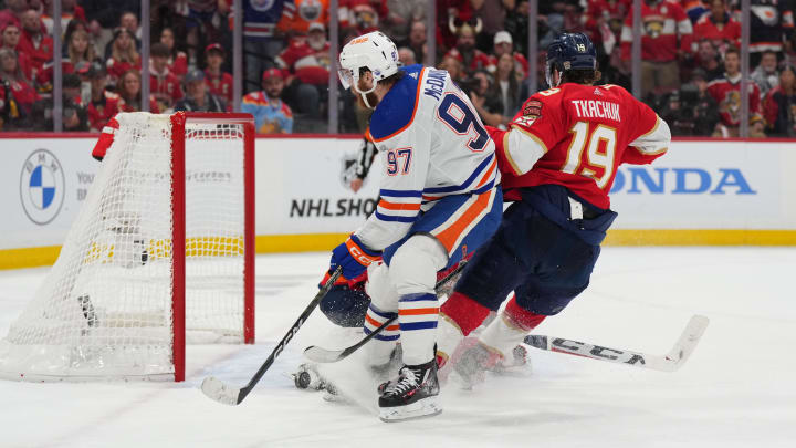 Jun 10, 2024; Sunrise, Florida, USA; Florida Panthers defenseman Brandon Montour (62) and Edmonton Oilers forward Evander Kane (91) during the third period in game two of the 2024 Stanley Cup Final at Amerant Bank Arena.