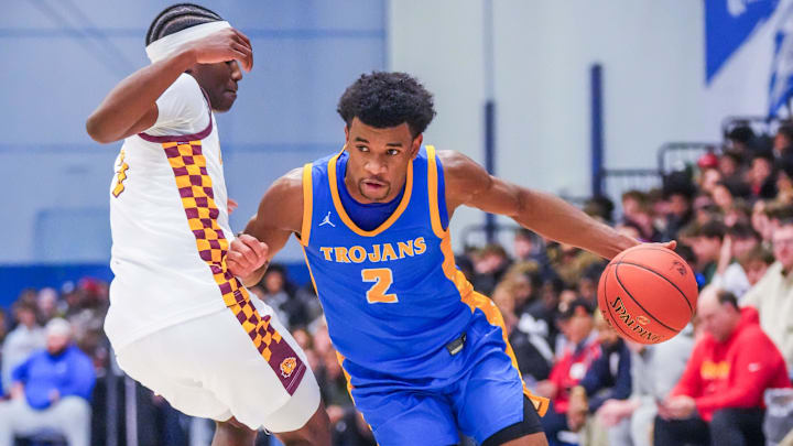 Wayzata's Christian Wiggins (2) breaks past West Allis Central's Yusef Gray Jr. (3) in the Rick Majerus WBY Shootout on Monday, Dec. 29, 2025, at Concordia University in Mequon, Wisconsin. West Allis Central won the game, 67-64.