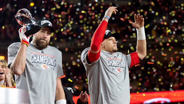 Jan 26, 2025; Kansas City, MO, USA; Confetti falls as Kansas City Chiefs tight end Travis Kelce (left) celebrates with the Lamar Hunt Trophy with quarterback Patrick Mahomes after defeating the Buffalo Bills during the AFC Championship game at GEHA Field at Arrowhead Stadium. Mandatory Credit: Mark J. Rebilas-Imagn Images Jan 26, 2025; Kansas City, MO, USA; Confetti falls as Kansas City Chiefs tight end Travis Kelce (left) celebrates with the Lamar Hunt Trophy with quarterback Patrick Mahomes after defeating the Buffalo Bills during the AFC Championship game at GEHA Field at Arrowhead Stadium. Mandatory Credit: Mark J. Rebilas-Imagn Images