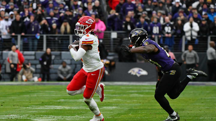 Jan 28, 2024; Baltimore, Maryland, USA; Kansas City Chiefs wide receiver Rashee Rice (4) runs with the ball against the Baltimore Ravens during the first half in the AFC Championship football game at M&T Bank Stadium. Mandatory Credit: Tommy Gilligan-USA TODAY Sports