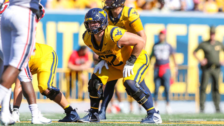 Aug 30, 2025; Morgantown, West Virginia, USA; West Virginia Mountaineers offensive lineman Phillip Bowser (62) pauses before a snap during the third quarter against the Robert Morris Colonials at Milan Puskar Stadium. Mandatory Credit: Ben Queen-Imagn Images