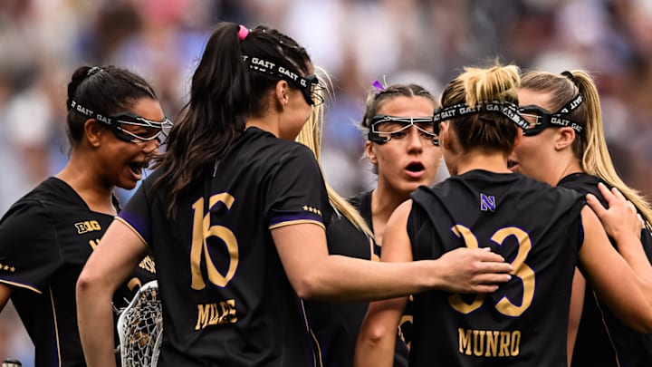 Northwestern huddles in the Women's Lacrosse National Championship Game against North Carolina on May 25, 2025.