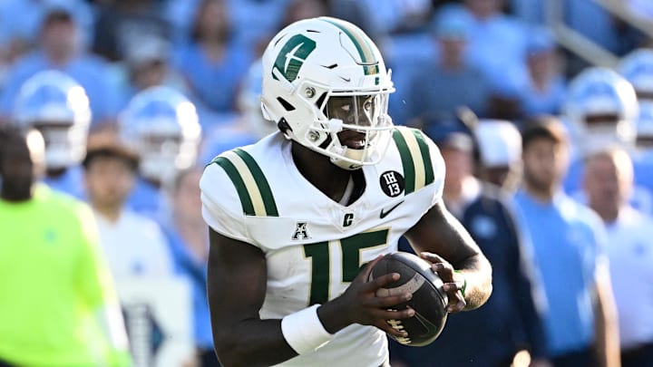 Sep 7, 2024; Chapel Hill, North Carolina, USA; Charlotte 49ers quarterback Deshawn Purdie (15) looks to pass in the third quarter at Kenan Memorial Stadium. Mandatory Credit: Bob Donnan-Imagn Images