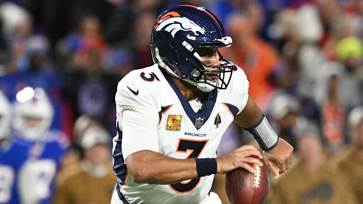 Nov 13, 2023; Orchard Park, New York, USA; Denver Broncos quarterback Russell Wilson (3) runs out of
