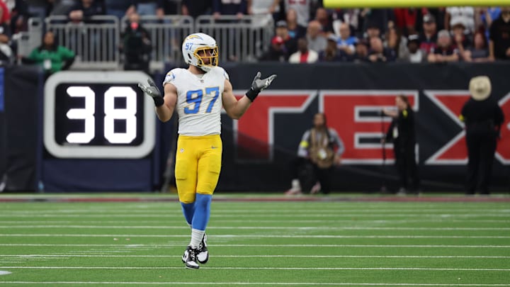 Jan 11, 2025; Houston, Texas, USA; Los Angeles Chargers outside linebacker Joey Bosa (97) reacts after sacking Houston Texans quarterback C.J. Stroud (7) (not pictured) in the first quarter in an AFC wild card game at NRG Stadium