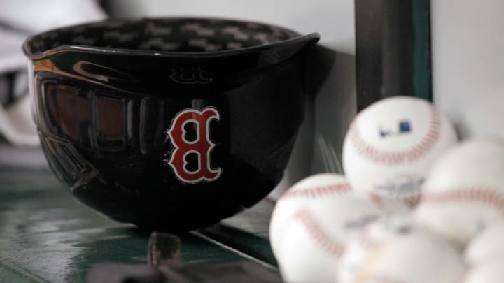 May 24, 2014; St. Petersburg, FL, USA; Boston Red Sox helmet lays in the dugout against the Tampa Bay Rays at Tropicana Field. Mandatory Credit: Kim Klement-USA TODAY Sports May 24, 2014; St. Petersburg, FL, USA; Boston Red Sox helmet lays in the dugout against the Tampa Bay Rays at Tropicana Field. Mandatory Credit: Kim Klement-USA TODAY Sports