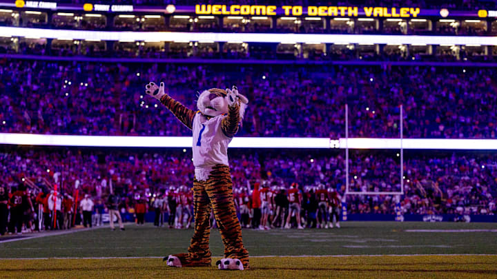 Sep 7, 2024; Baton Rouge, Louisiana, USA; LSU Tigers mascot Mike the Tiger performs for fans during a time out against the Nicholls State Colonels during the second half at Tiger Stadium. Mandatory Credit: Stephen Lew-Imagn Images