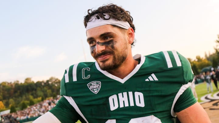 Ohio Bobcats quarterback Parker Navarro (13) celebrates after defeating the West Virginia Mountaineers