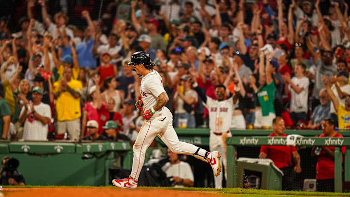 Jul 8, 2025; Boston, Massachusetts, USA; Boston Red Sox outfielder Jarren Duran (16) hits a home run against the Colorado Rockies in the seventh inning at Fenway Park. Mandatory Credit: David Butler II-Imagn Images
